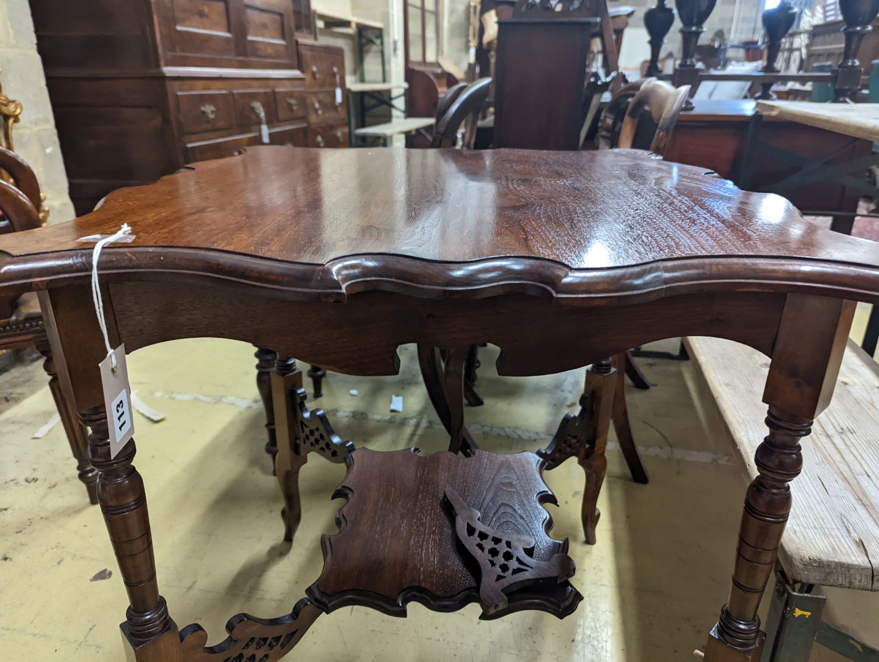 A late Victorian walnut centre table, width 67cm, depth 64cm, height 75cm